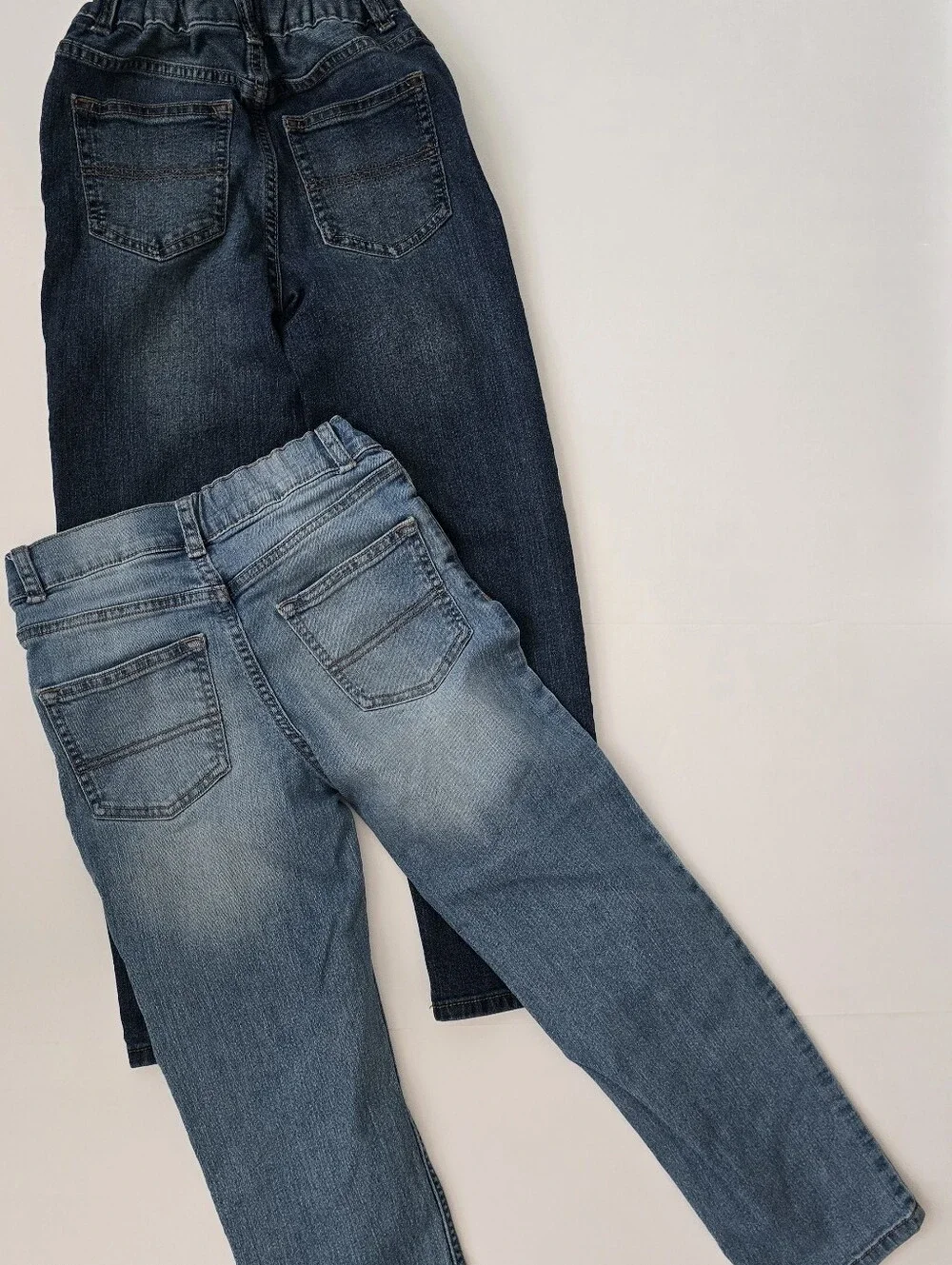 2 Pack. OshKosh B'gosh Kid's Straight Jeans in Light Blue and Dark Blue